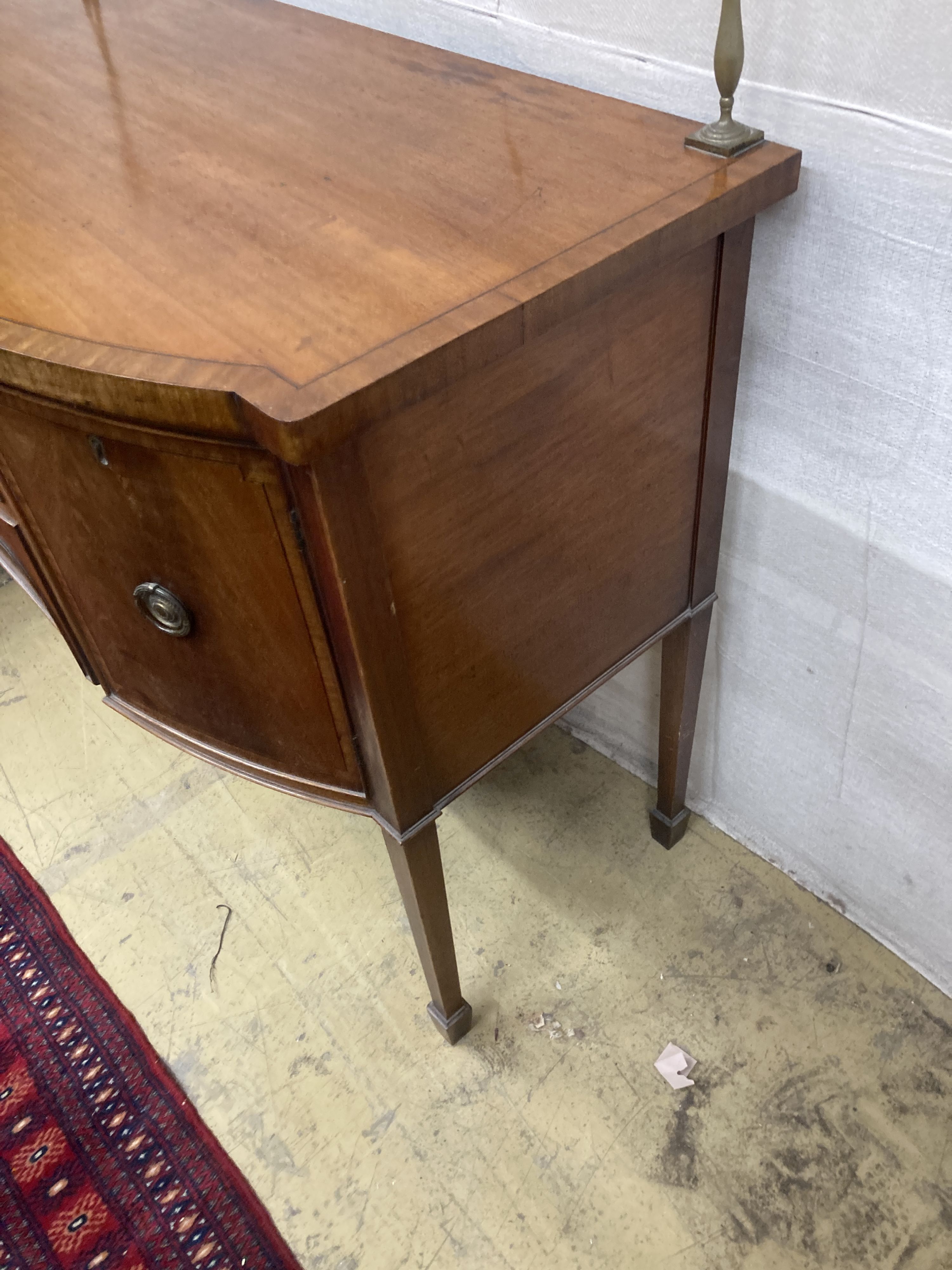 A small George III style mahogany bowfront sideboard, length 115cm, depth 56cm, height 120cm